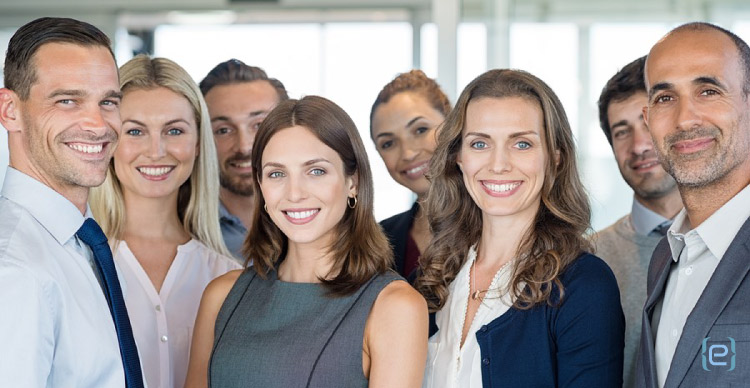 Portrait of successful group of business people at modern office